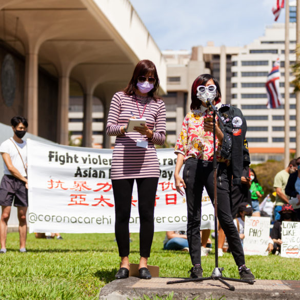Two demonstrators at the Stop Asian Hate rally in Honolulu