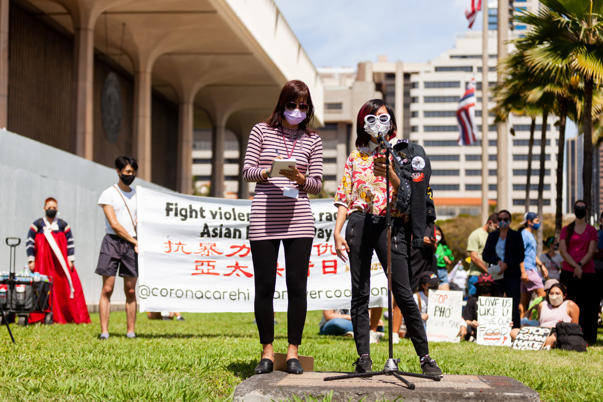 Two demonstrators at the Stop Asian Hate rally in Honolulu