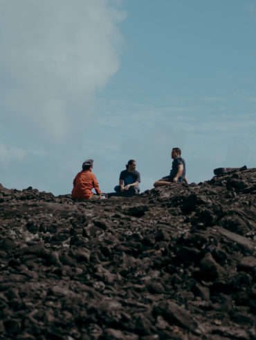 Three Native Hawaiians gather at Kumukahi, Puna, Hawaii Island.