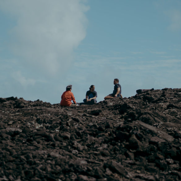 Three Native Hawaiians gather at Kumukahi, Puna, Hawaii Island.