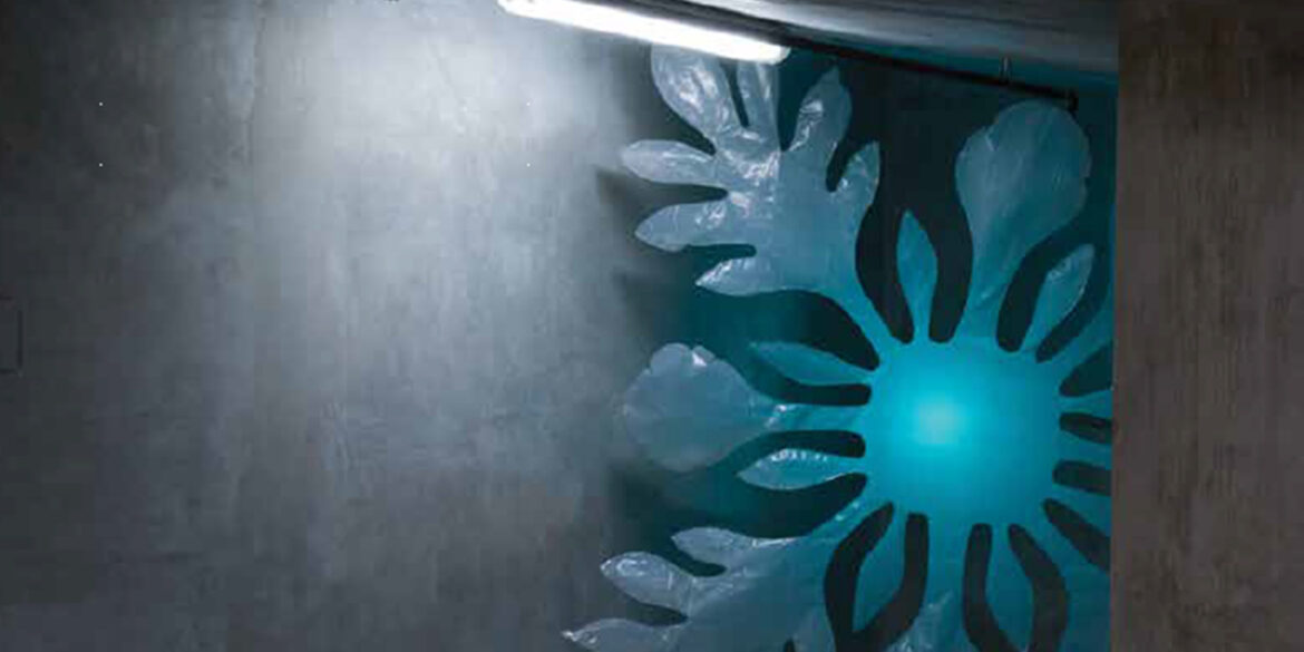 a blue flower made out of plastic