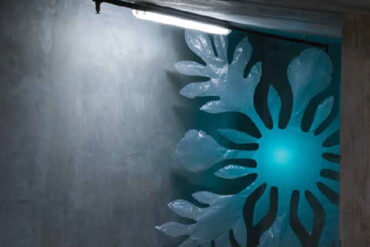 a blue flower made out of plastic