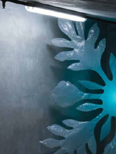 a blue flower made out of plastic