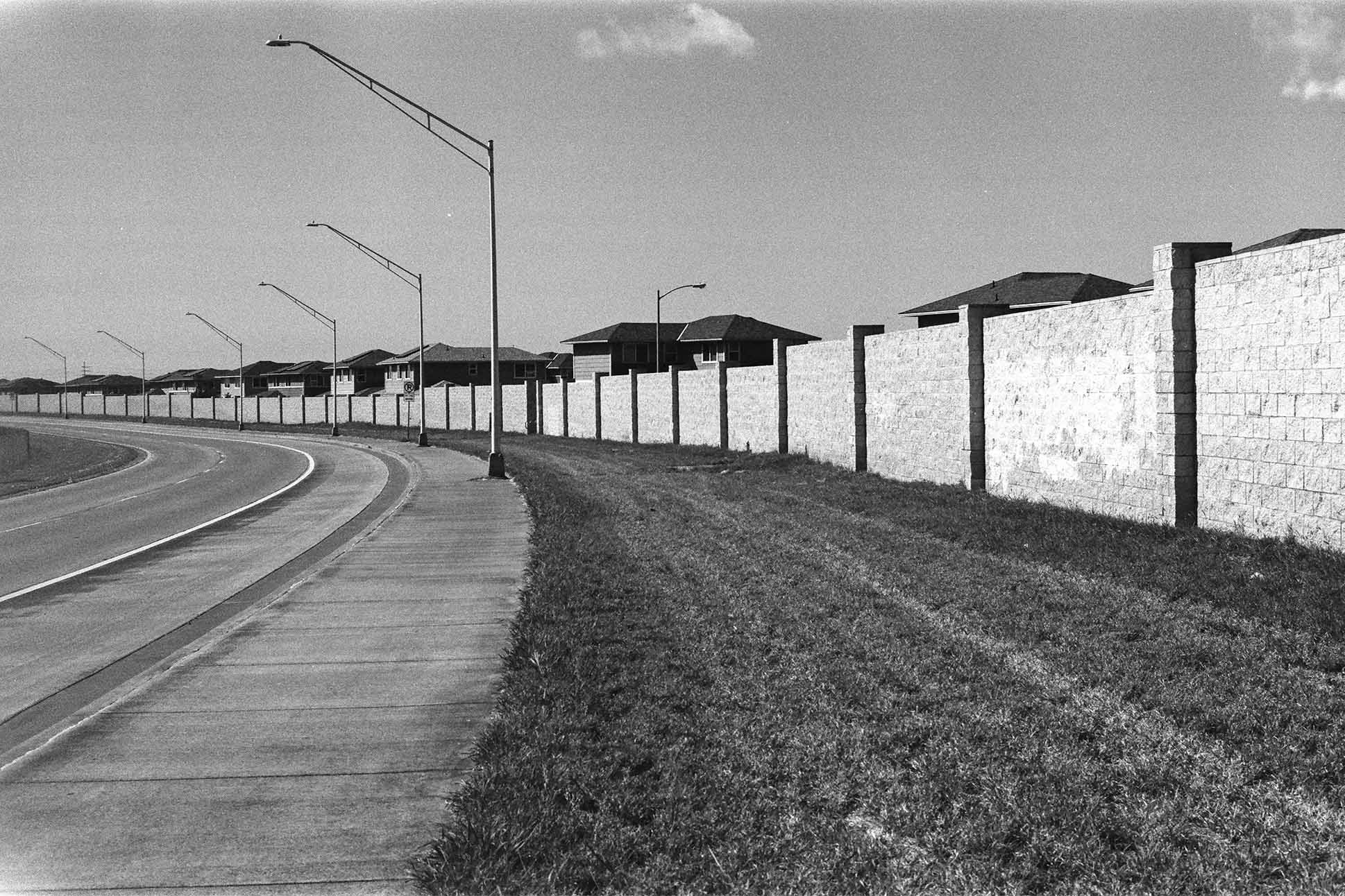 liminal space photography of an empty suburban street